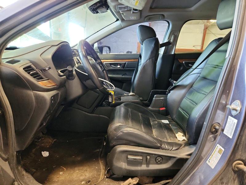 Photo 7 from auction – 2018 HONDA CR-V with VIN 7FARW2H93JE089994