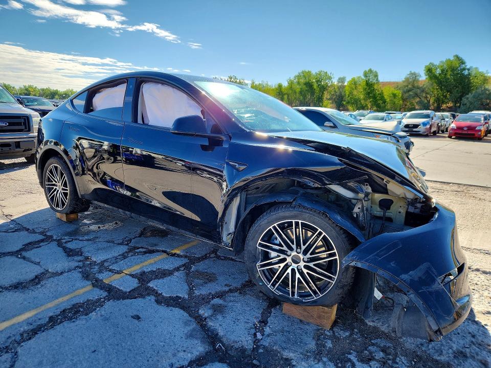 Photo 4 from auction – 2023 TESLA MODEL Y with VIN 7SAYGDEE4PF711290