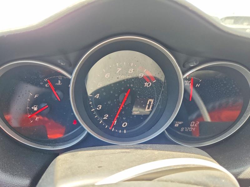 Photo 9 from auction – 2004 MAZDA RX8 with VIN JM1FE173540135921