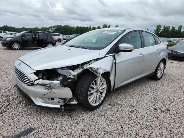 FORD FOCUS 2017 with VIN 1FADP3J20HL229115 - Photo from auction