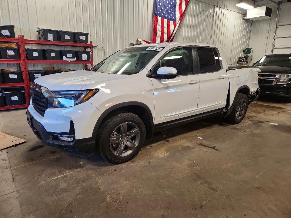HONDA RIDGELINE 2023 with VIN 5FPYK3F5XPB004562 - Photo from auction