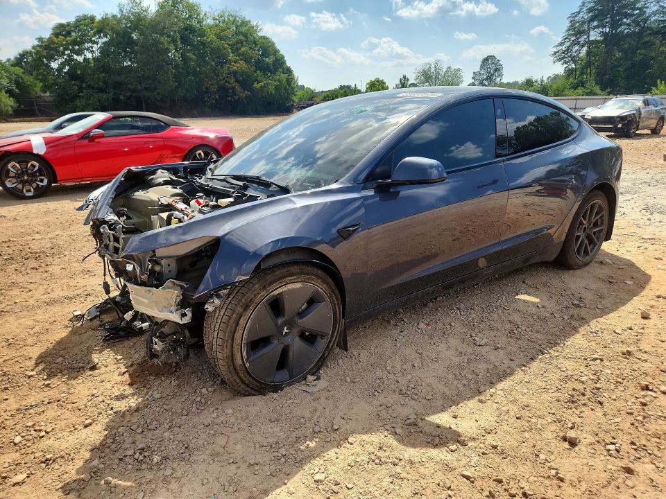 TESLA MODEL 3 2023 with VIN 5YJ3E1EA3PF396541 - Photo from auction