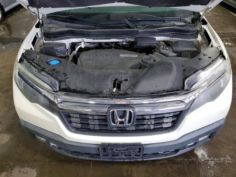 Photo 11 from auction – 2019 HONDA RIDGELINE with VIN 5FPYK3F58KB013947