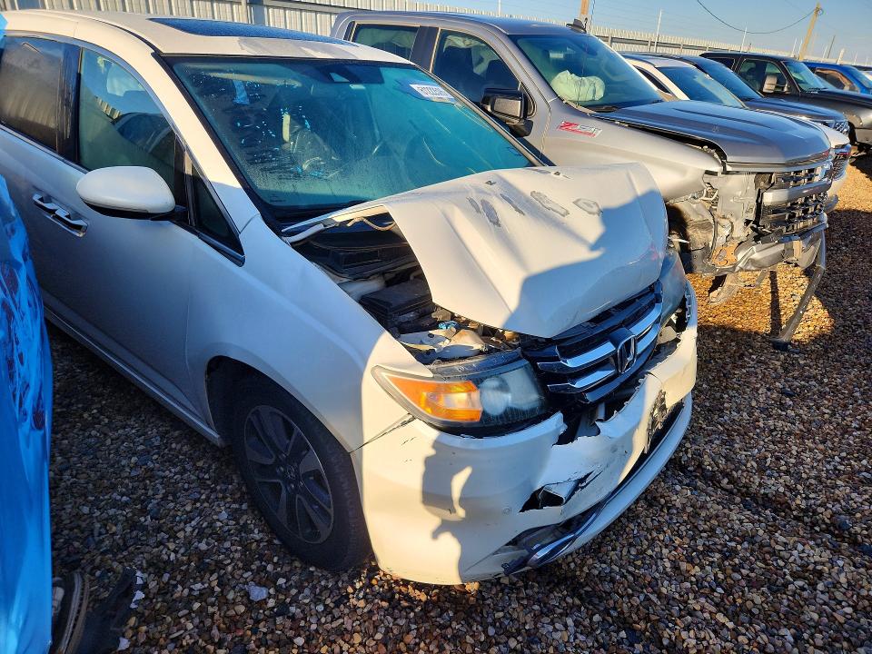 Photo 4 from auction – 2014 HONDA ODYSSEY with VIN 5FNRL5H93EB045179