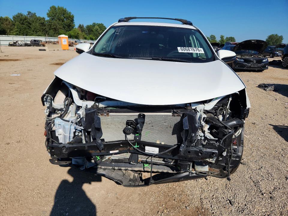 Photo 5 from auction – 2018 TOYOTA RAV4 with VIN 2T3RFREV5JW856809
