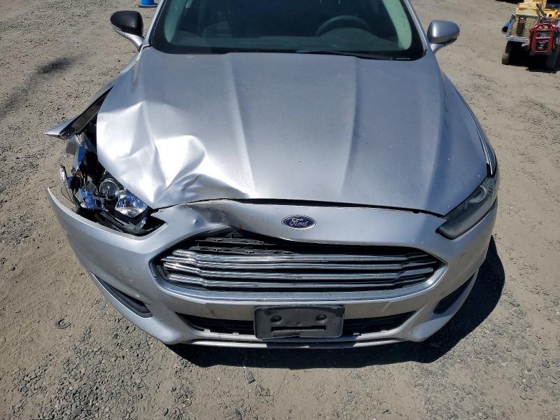 Photo 11 from auction – 2016 FORD FUSION with VIN 3FA6P0H74GR134520