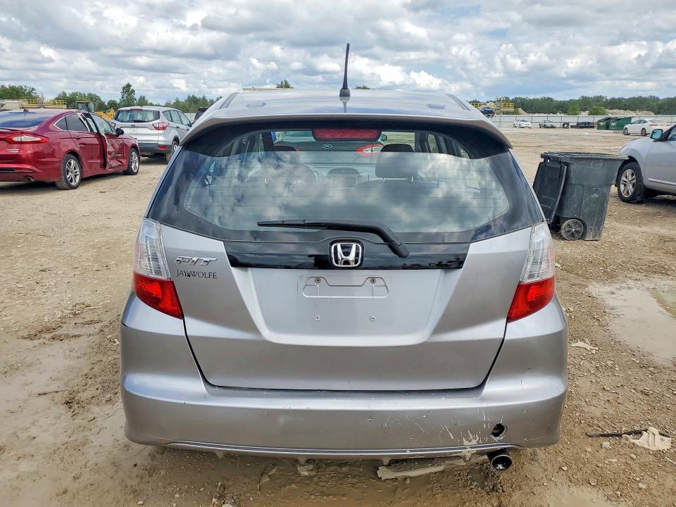 Photo 6 from auction – 2009 HONDA FIT with VIN JHMGE88649S006522