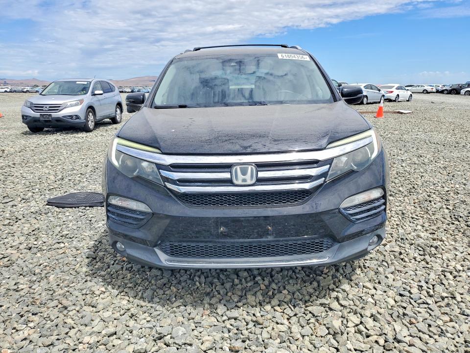 Photo 5 from auction – 2016 HONDA PILOT with VIN 5FNYF6H94GB095200