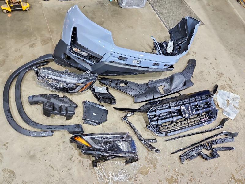 Photo 12 from auction – 2024 HONDA RIDGELINE with VIN 5FPYK3F17RB031329