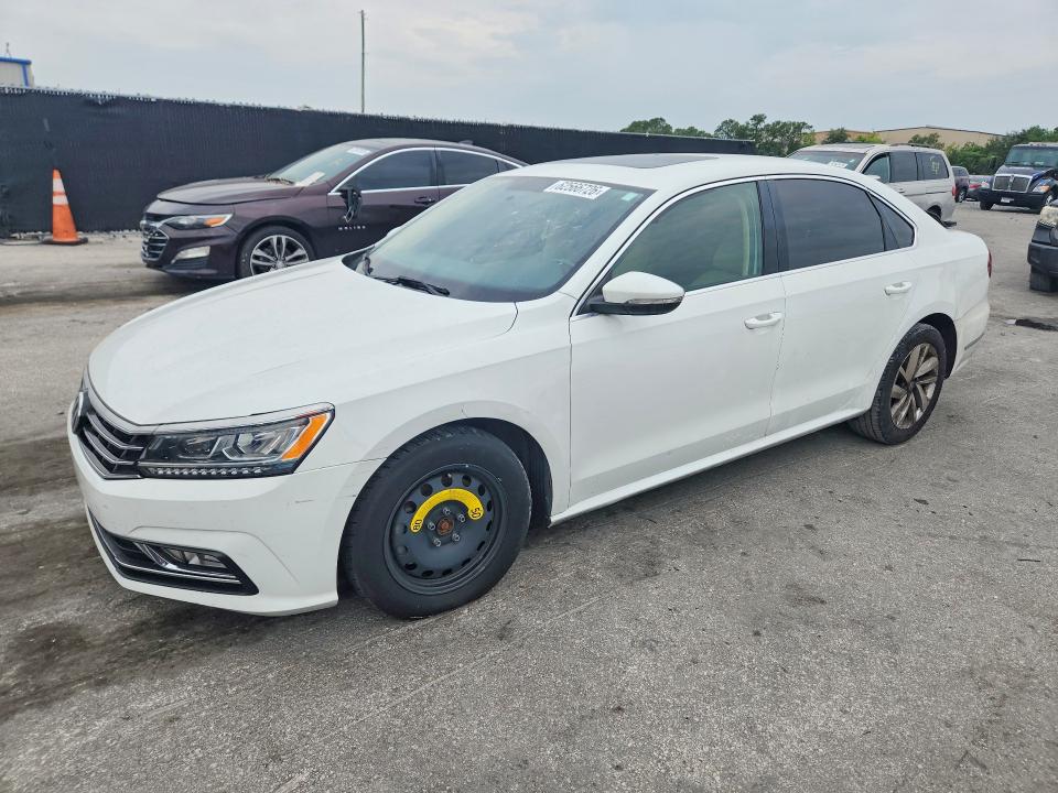 VOLKSWAGEN PASSAT 2018 with VIN 1VWBA7A35JC003514 - Photo from auction