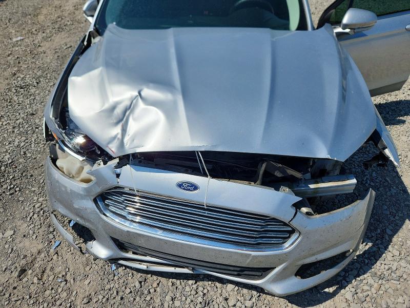Photo 11 from auction – 2016 FORD FUSION with VIN 3FA6P0H76GR274620
