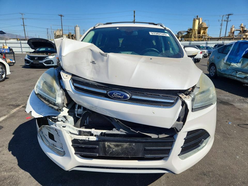 Photo 5 from auction – 2013 FORD ESCAPE with VIN 1FMCU0J99DUC03347
