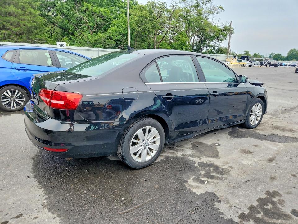 Photo 3 from auction – 2015 VOLKSWAGEN JETTA with VIN 3VWD07AJ9FM422871