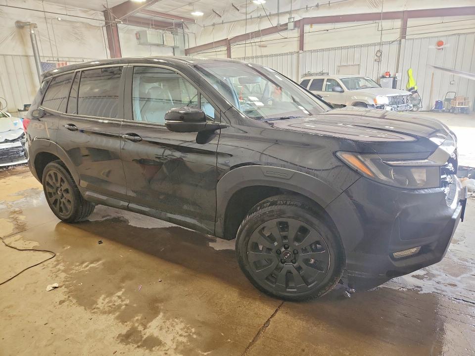 Photo 4 from auction – 2023 HONDA PASSPORT with VIN 5FNYF8H50PB033012
