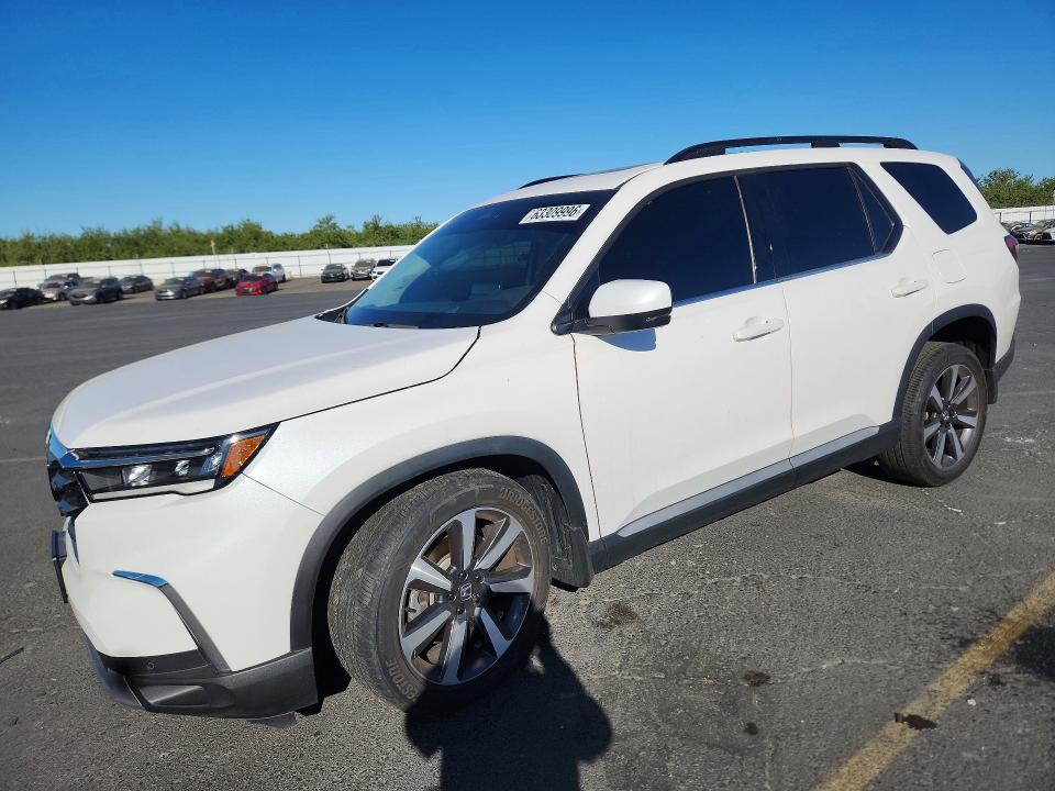 HONDA PILOT 2023 with VIN 5FNYG1H82PB030773 - Photo from auction