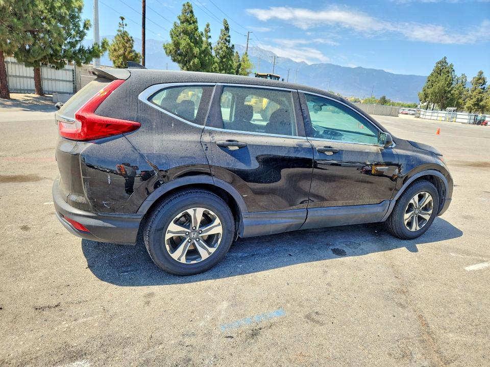 Photo 3 from auction – 2019 HONDA CR-V with VIN 2HKRW5H37KH418031
