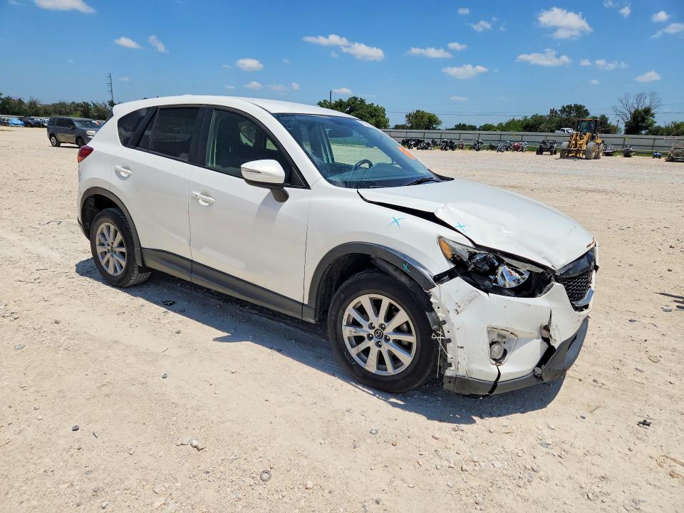 Photo 4 from auction – 2015 MAZDA CX-5 with VIN JM3KE2CY1F0531103