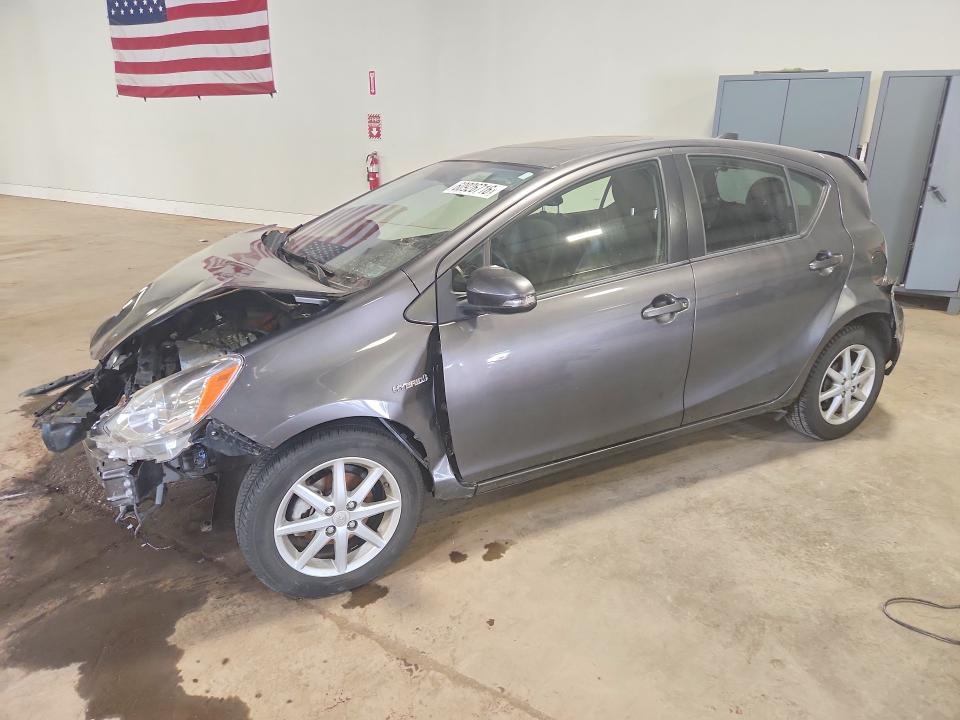 TOYOTA PRIUS C 2016 with VIN JTDKDTB3XG1115859 - Photo from auction