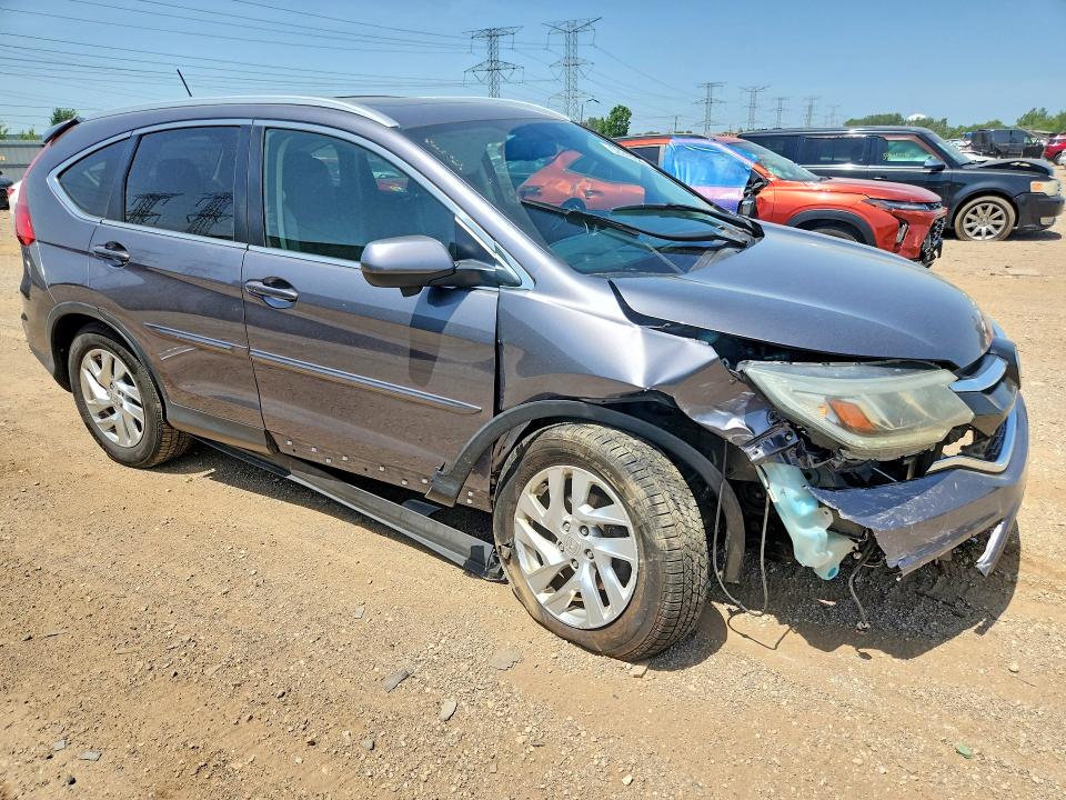 Photo 4 from auction – 2015 HONDA CR-V with VIN 5J6RM4H77FL081858