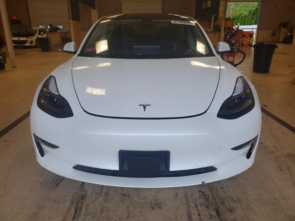 Photo 5 from auction – 2021 TESLA MODEL 3 with VIN 5YJ3E1EB3MF065396