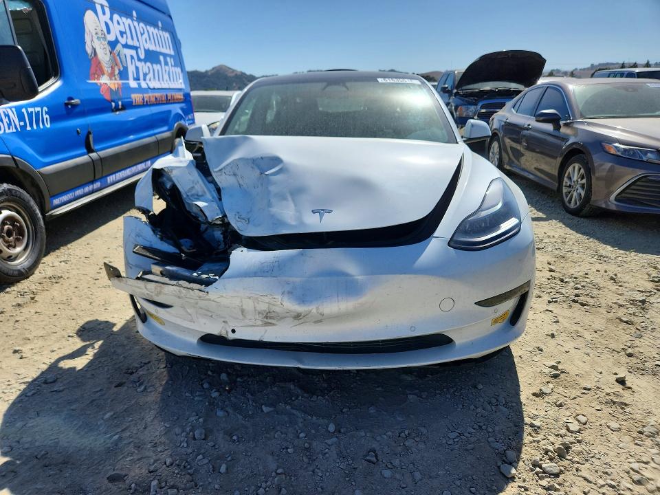 Photo 5 from auction – 2021 TESLA MODEL 3 with VIN 5YJ3E1EA3MF074798
