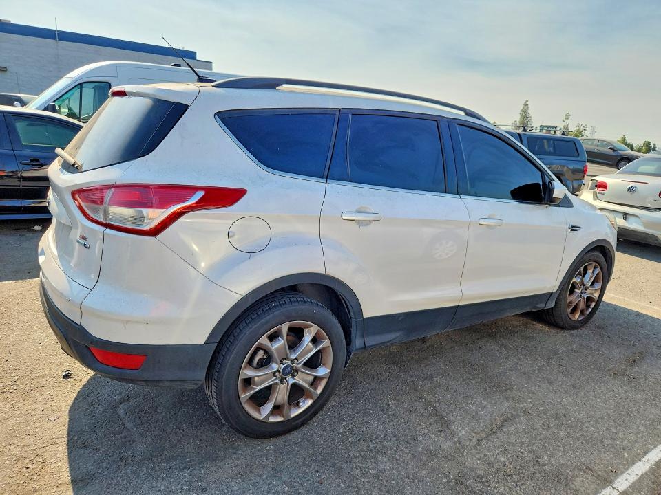 Photo 3 from auction – 2014 FORD ESCAPE with VIN 1FMCU9G97EUB32789