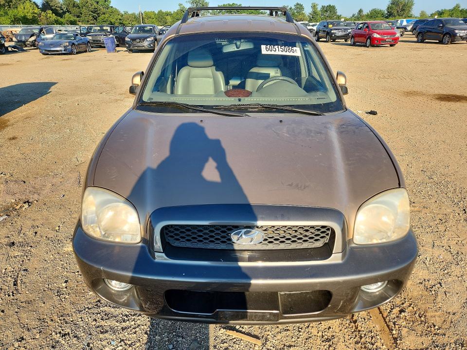 Photo 5 from auction – 2002 HYUNDAI SANTA FE with VIN KM8SC73D32U314028