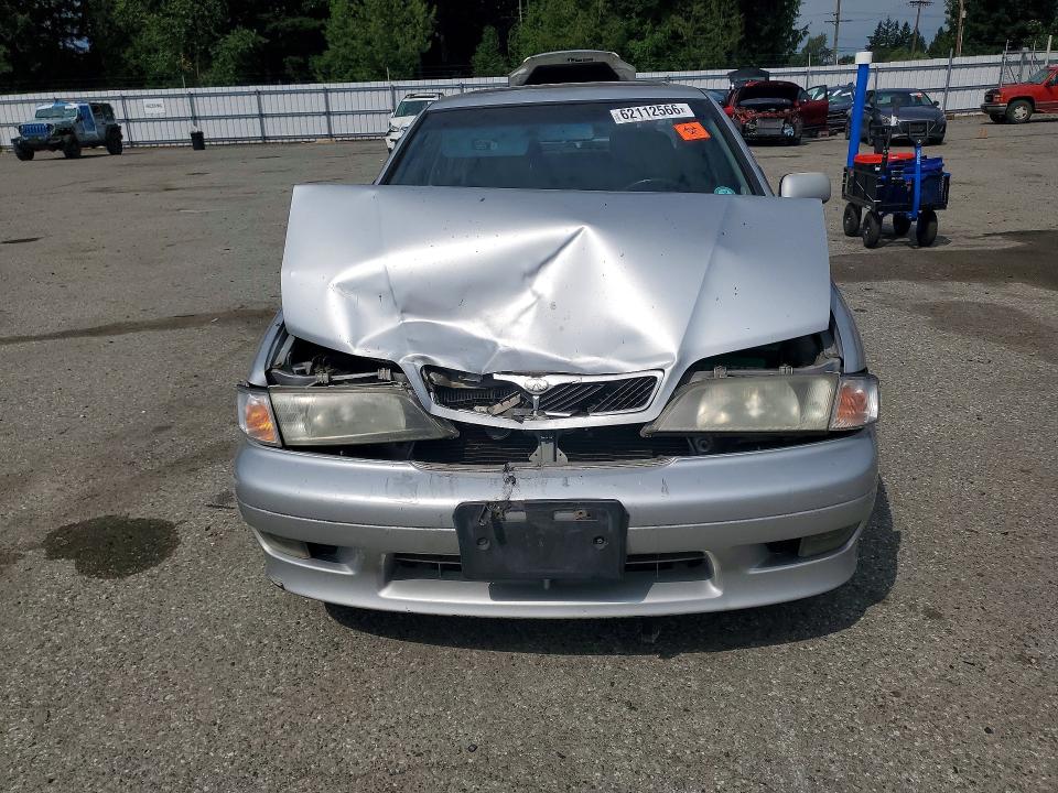 Photo 5 from auction – 2002 INFINITI G20 with VIN JNKCP11A52T506493