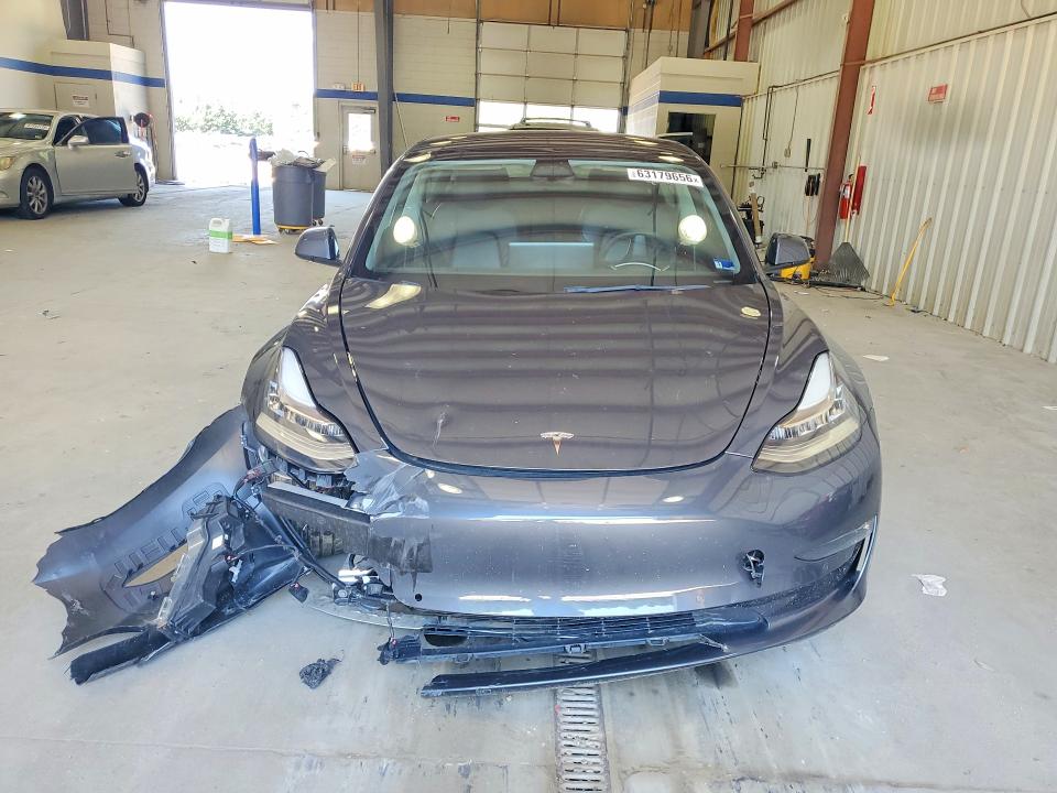 Снимка 5 от търг – 2022 TESLA MODEL 3 с VIN 5YJ3E1EB0NF262916
