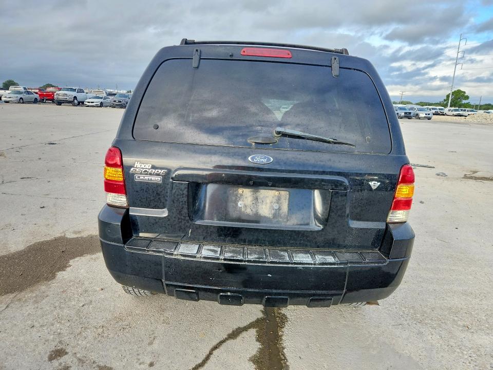 Photo 6 from auction – 2007 FORD ESCAPE with VIN 1FMYU04137KA75313