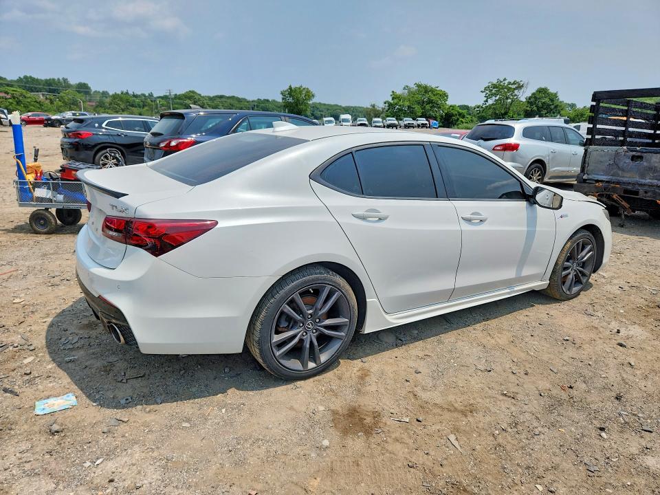 Photo 3 from auction – 2019 ACURA TLX with VIN 19UUB2F66KA005995