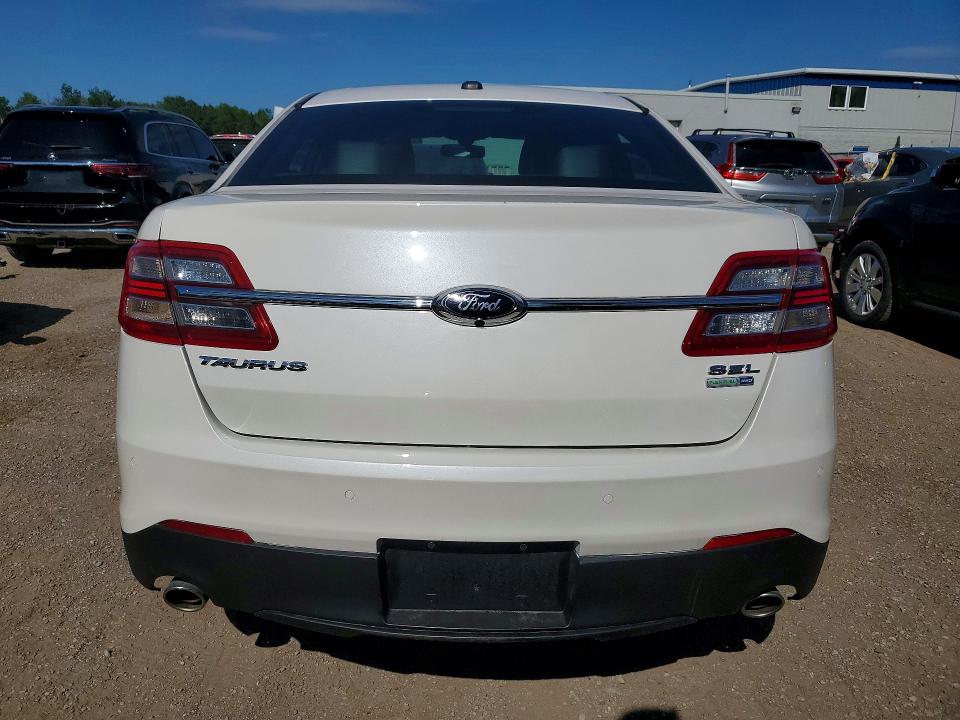 Photo 6 from auction – 2014 FORD TAURUS with VIN 1FAHP2H8XEG180693