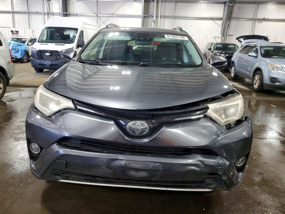 Photo 5 from auction – 2018 TOYOTA RAV4 with VIN JTMRFREV5JD254375