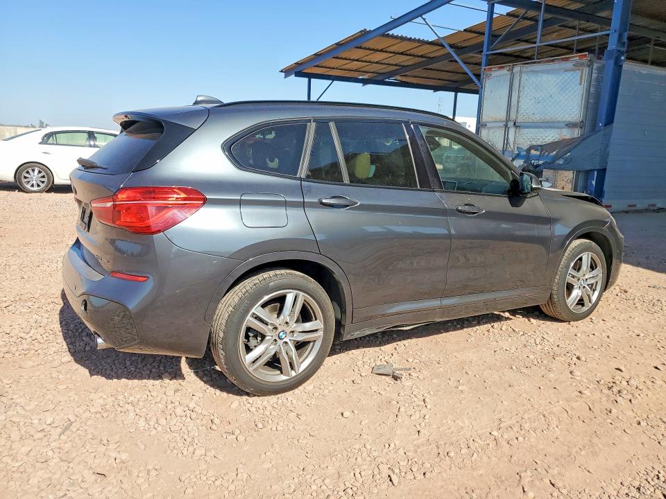 Photo 3 from auction – 2018 BMW X1 with VIN WBXHT3C35J5L32105