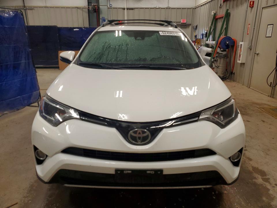 Photo 5 from auction – 2017 TOYOTA RAV4 with VIN JTMRFREV0HD218586