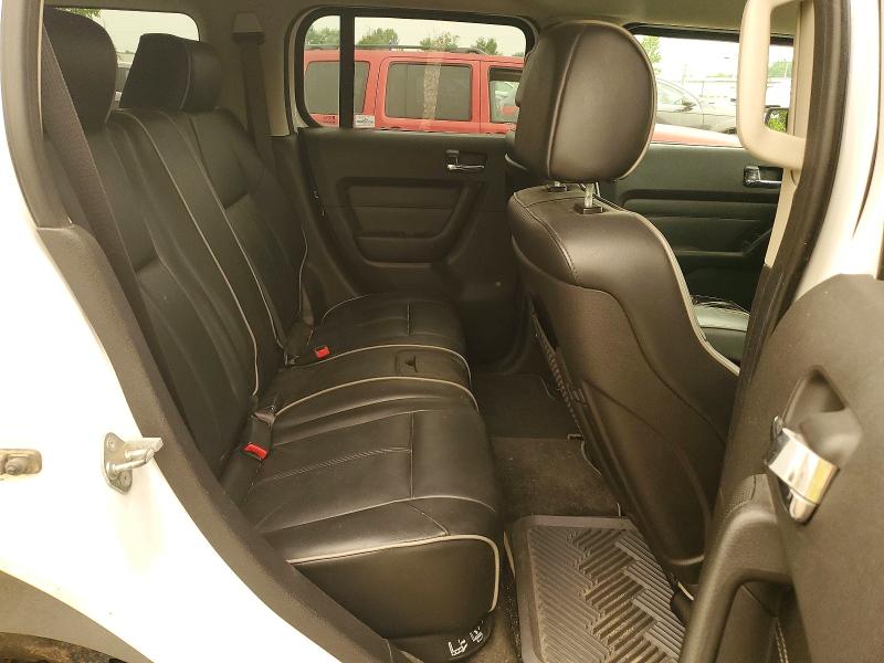 Photo 11 from auction – 2007 HUMMER H3 with VIN 5GTDN13E778203648
