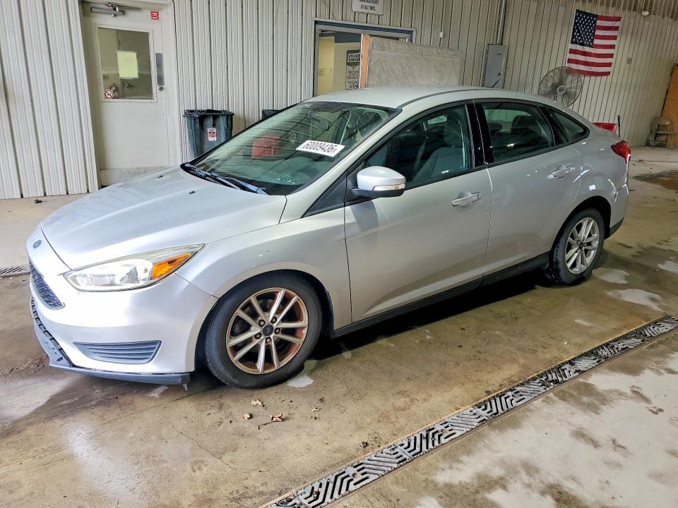 FORD FOCUS 2016 with VIN 1FADP3F25GL270136 - Photo from auction