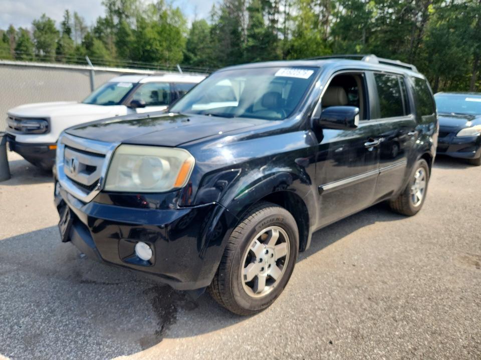 HONDA PILOT 2010 with VIN 5FNYF4H96AB502798 - Photo from auction