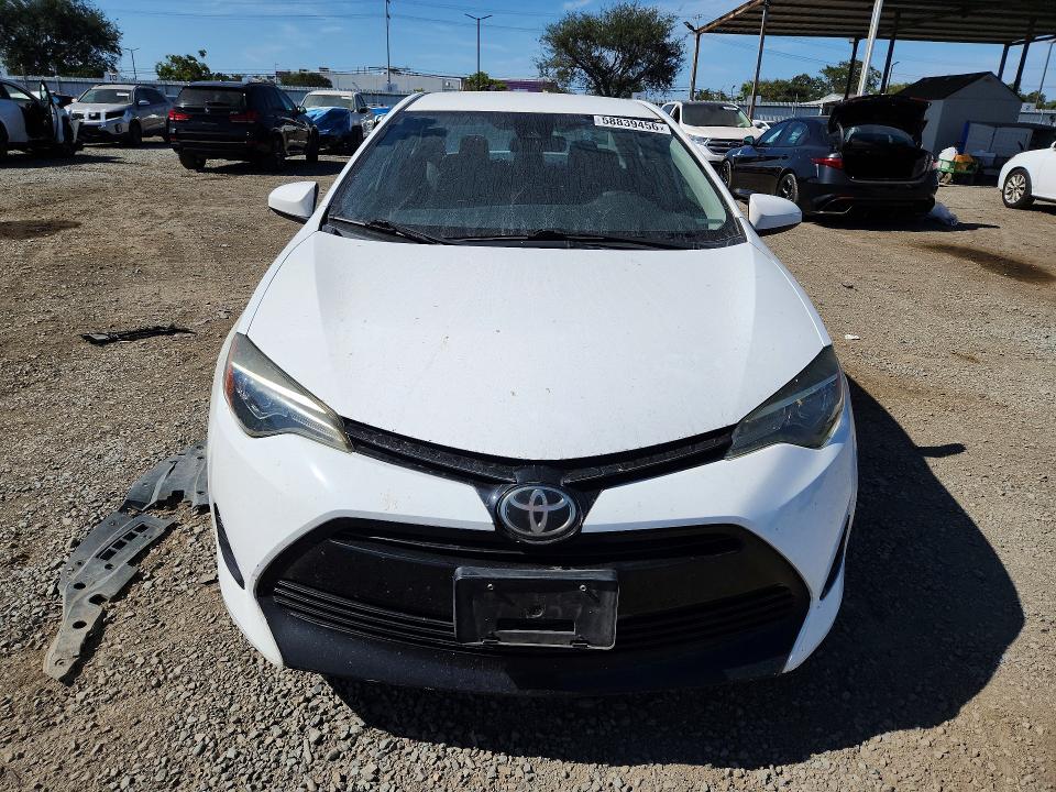 Photo 5 from auction – 2017 TOYOTA COROLLA with VIN 5YFBURHE1HP712178