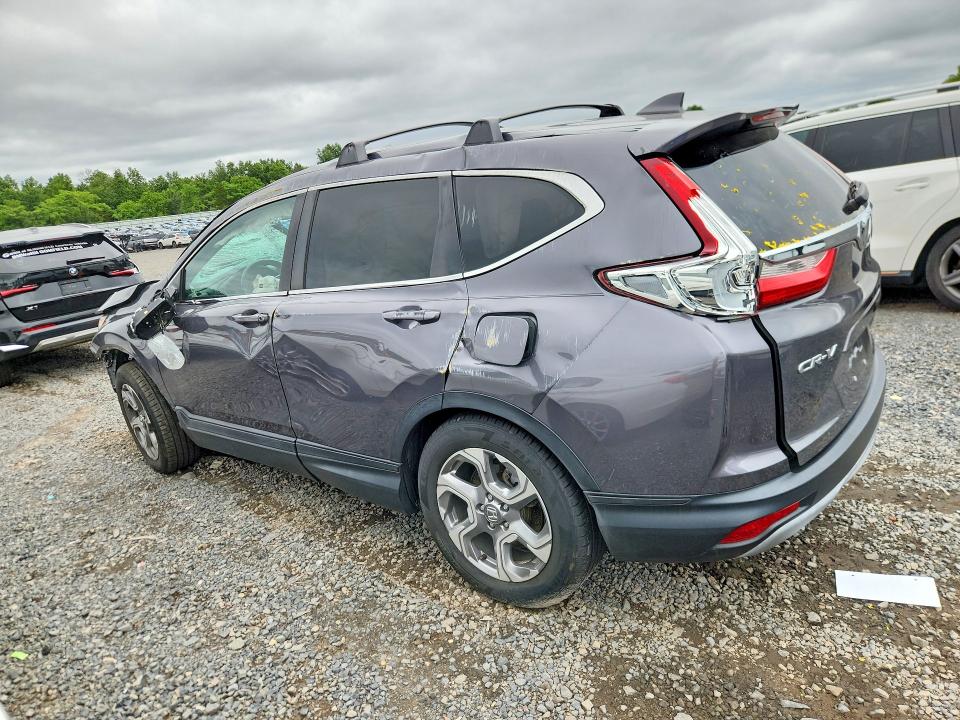 Photo 2 from auction – 2018 HONDA CR-V with VIN 2HKRW2H82JH641053