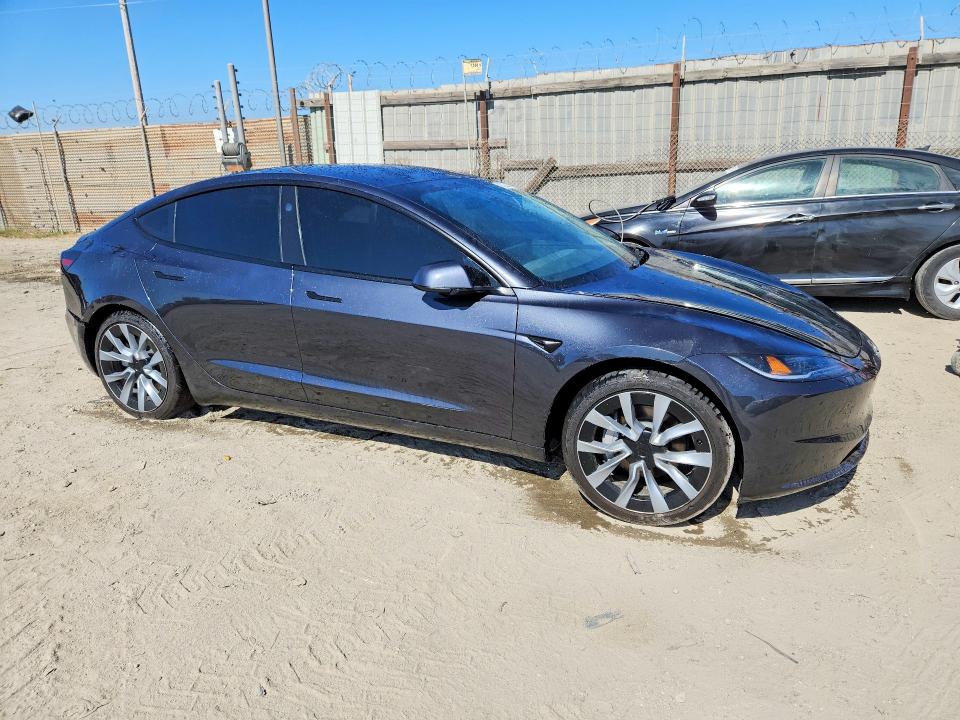 Photo 4 from auction – 2026 TESLA MODEL 3 with VIN 5YJ3E1EA7TF137710