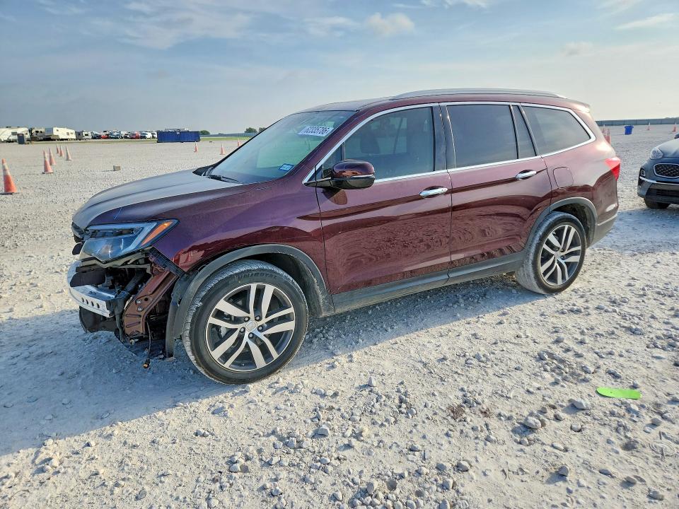 HONDA PILOT 2017 with VIN 5FNYF5H97HB015576 - Photo from auction