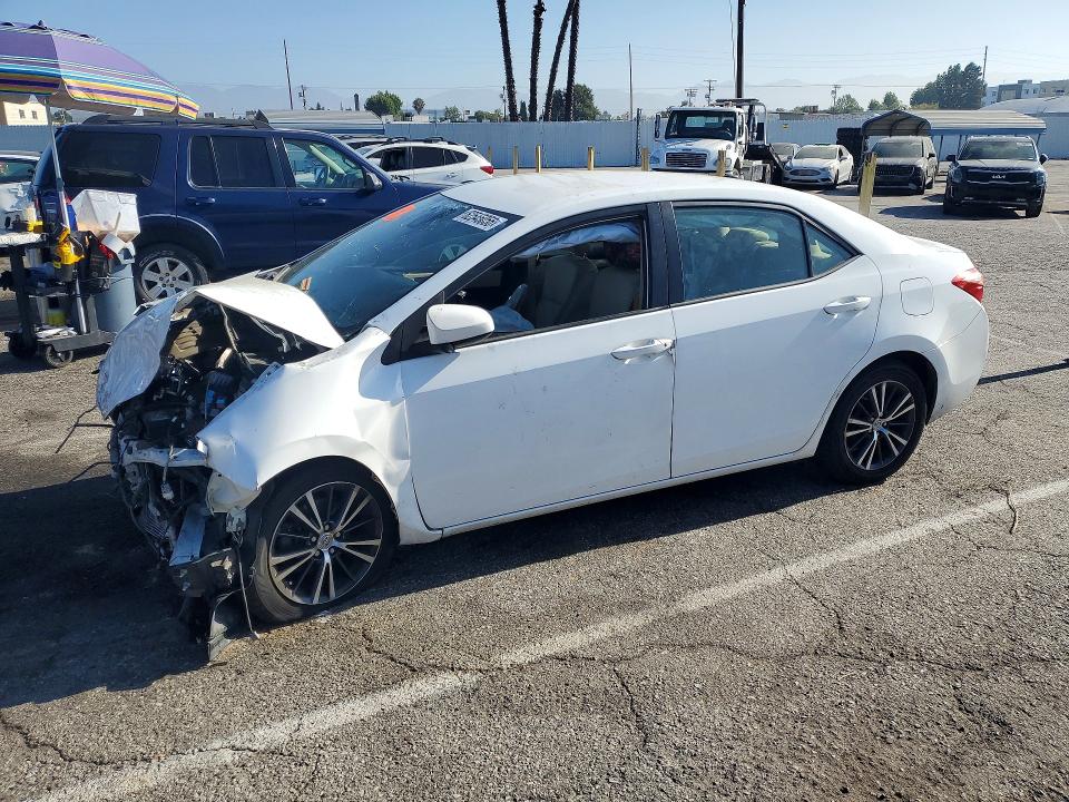 TOYOTA COROLLA 2017 with VIN 5YFBURHE6HP652270 - Photo from auction