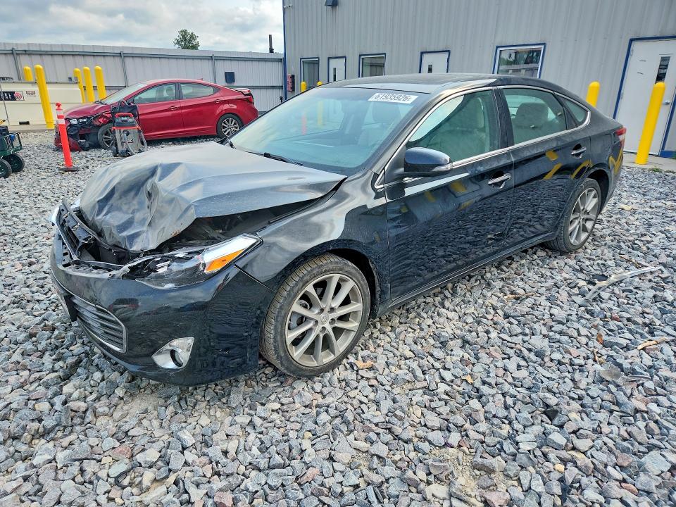 TOYOTA AVALON 2014 with VIN 4T1BK1EB2EU135138 - Photo from auction