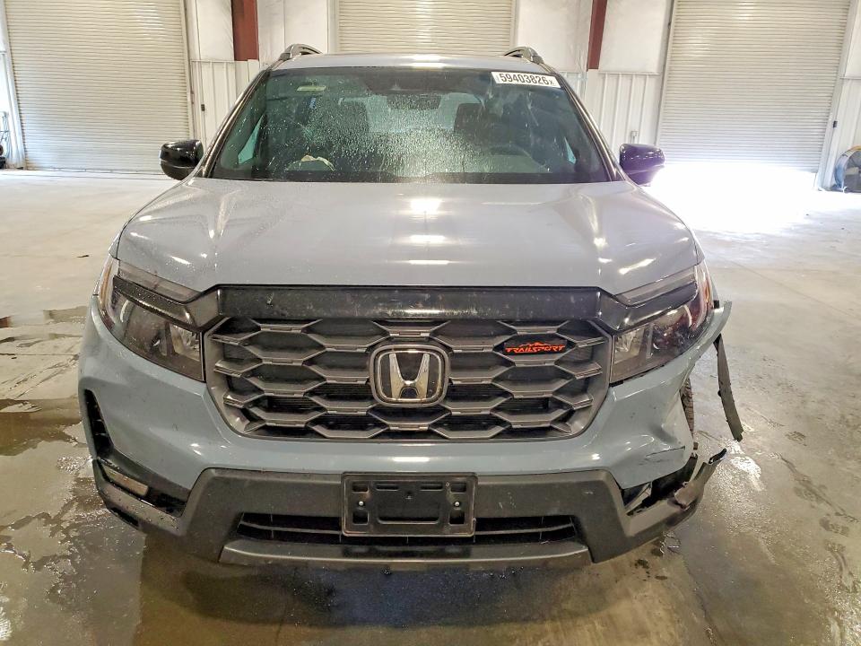 Photo 5 from auction – 2024 HONDA PASSPORT with VIN 5FNYF8H61RB019924