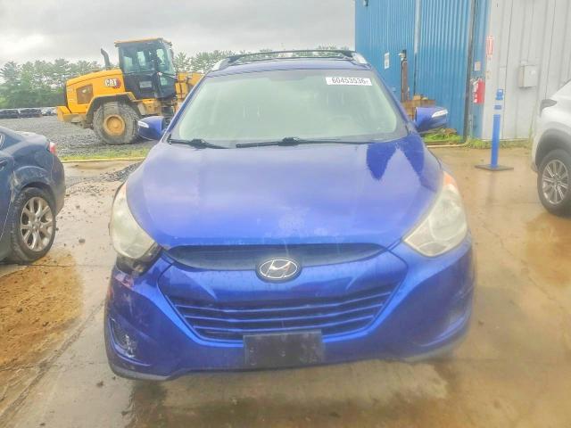 Photo 5 from auction – 2012 HYUNDAI TUCSON with VIN KM8JUCAC8CU371872