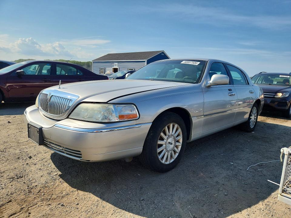 Photo 1 from auction – 2003 LINCOLN TOWN CAR with VIN 1LNHM81W13Y699696