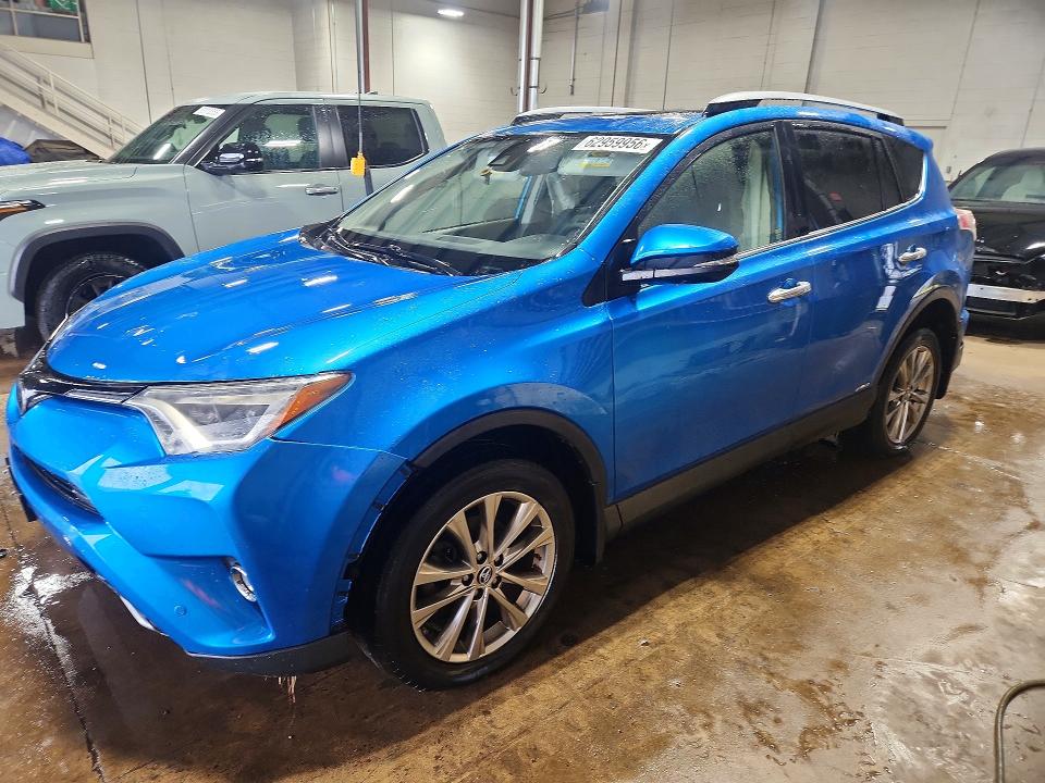 TOYOTA RAV4 HV 2018 with VIN JTMDJREV6JD165469 - Photo from auction