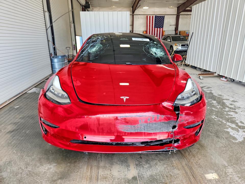 Photo 5 from auction – 2021 TESLA MODEL 3 with VIN 5YJ3E1EA3MF859449