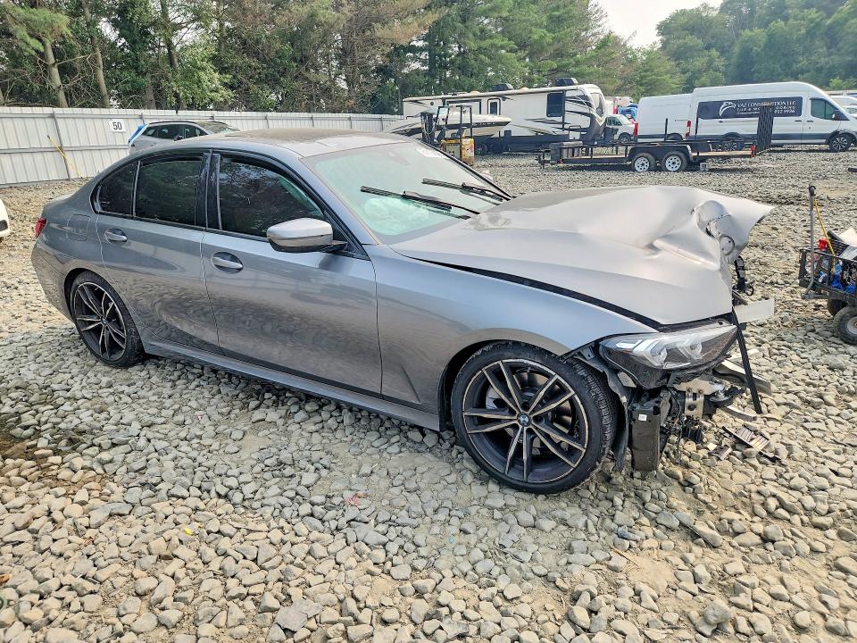 Photo 4 from auction – 2023 BMW 330XI with VIN 3MW89FF08P8D21462